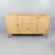 A 1930s Heals Art Deco sideboard in bleached walnut. 168x98x58cm. Overall well used condition.