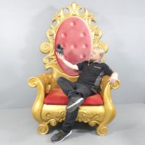 A very large and impressive resin and upholstered throne chair. Overall 125x207x100cm, seat