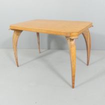 A French Art Deco oak spider leg coffee table. 76x50x47cm.