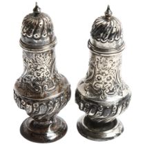 A pair of Victorian embossed and fluted pepperettes, hallmarks for Birmingham 1889