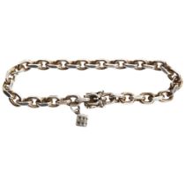 A sterling silver chain link bracelet, with lucky dice charm