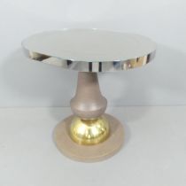A contemporary design chrome banded table with decanter shaped pedestal stem on brass dome in the