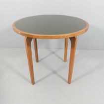 A mid-century design teak dining table with inset linoleum top. 85x75cm.