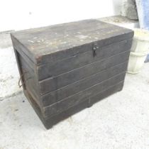 A carpenter's tool chest containing various wood-working tools including awls, planes, saws etc.