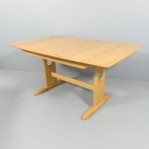 ERCOL - a model 1193 Windsor draw-leaf dining table. 150x73x92cm (extending to 200cm). Current