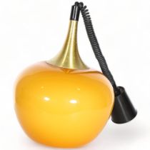 A 1960/70s' Guzzini style "rise & fall" pendant lamp, with amber glass shade and gilt metal