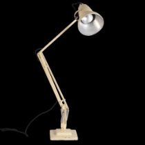 A Herbert Terry Anglepoise lamp, cream paintwork, original two-step base, makers stamp, approx