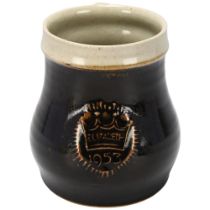 Leach Pottery, St Ives, a 1953 Elizabeth II commemorative coronation mug, with crown decoration,