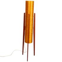 A Mid-Century teak ‘Rocket Lamp’ with amber fibre glass shade, 1960/70’s, height 113cm Cracks in