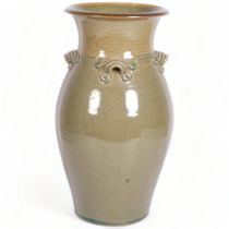 A large studio pottery vase with 4 lugged handles, makers mark to base, height 38.5cm Good