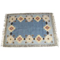 A vintage Swedish double sided flat weave rug (Rollakan),