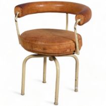 Charlotte Perriand, an early Siege Tournant LC7 swivel chair in leather and painted steel