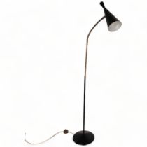 G A Scott for MacLamp a late 1950s' floor lamp, with adjustable neck and black shade,