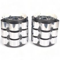 Attributed to Werner Schou, a pair of 1970s, aluminium, ceiling lampshades, height 21cm Some pitting
