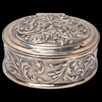 A German silver dressing table box, imported by Berthold Muller, London 1910, oval form with