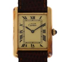 MUST DE CARTIER - a mid-size vermeil sterling silver Tank mechanical wristwatch, cream dial with