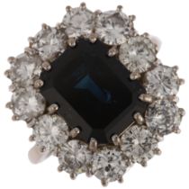 An 18ct white gold sapphire and diamond rectangular cluster ring, maker JHL, London 1973, claw set