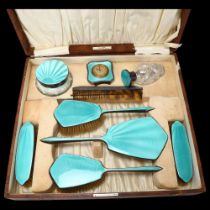 An Art Deco George V silver and teal enamel 9-piece dressing table set, Daniel Manufacturing Co,