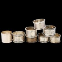 8 silver napkin rings, including millennium example, 7.8oz total No damage or repair