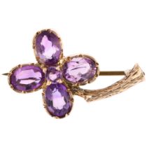 A late 20th century 9ct rose gold amethyst 4-leaf clover brooch, maker P Brothers, London 1973, 28.