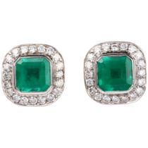 A pair of 18ct white gold emerald and diamond square cluster earrings, each set with an octagonal