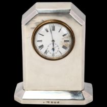 An Art Deco George V silver mantel clock, Spurrier & Co, Birmingham 1924, white enamel dial with