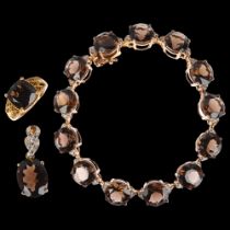 A matched smoky quartz and diamond jewellery set, comprising sterling silver-gilt bracelet, 19cm,