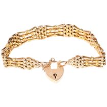 An early 20th century 9ct gold gatelink bracelet, with 9ct heart padlock clasp, 18cm, 18.1g Safety