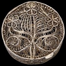 An Indian silver filigree floral box, circular form, 6cm Edges are slightly bent otherwise no