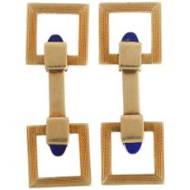 A pair of 14ct gold lapis lazuli snaffle horse bit pattern cufflinks, each with square engine turned