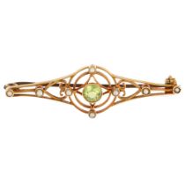 An Edwardian 15ct gold peridot and pearl openwork brooch, 45mm, 4.3g No damage or repair, brooch