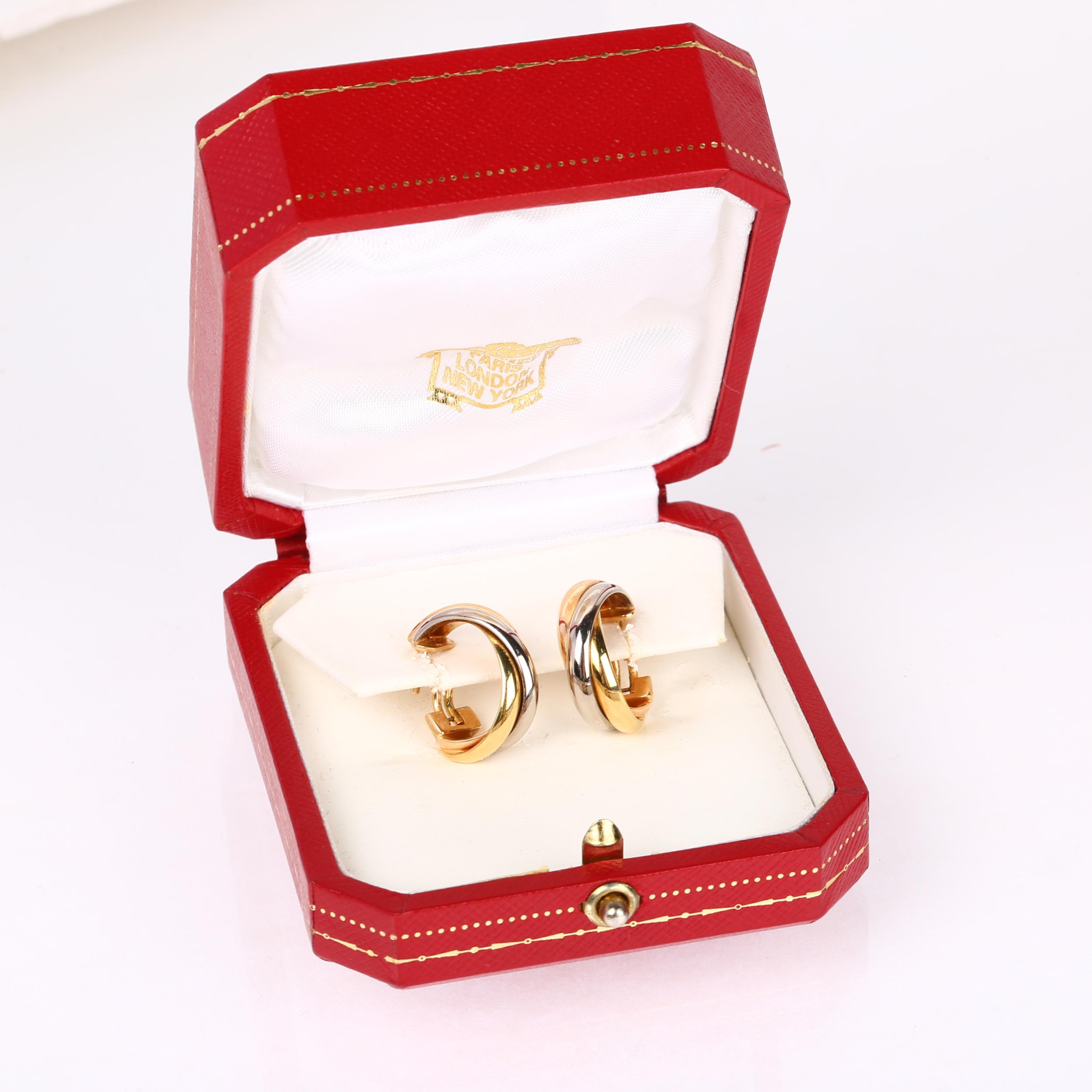 CARTIER - a pair of 18ct three-colour gold Trinity hoop earrings, with English lock fittings, signed - Image 4 of 4