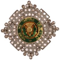 An 18ct gold and platinum Order of the Thistle, central green enamel boss depicting thistle and