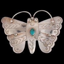 A Native American Navajo silver and turquoise figural butterfly brooch, 62.9mm, 11.5g No damage or