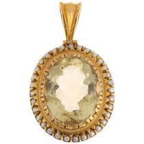A 14ct gold citrine and whole pearl oval cluster pendant, centrally claw set with 27ct oval mixed-