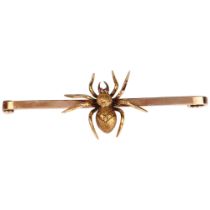 An Edwardian ruby figural spider bar brooch, circa 1910, unmarked gold set en tremblant with