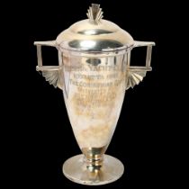 An Art Deco George V silver 2-handled trophy cup and cover, Joseph Gloster Ltd, Birmingham 1934,