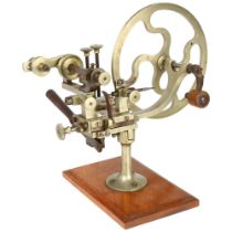 A 19th century watchmaker's topping tool, Swiss/French, nickel and steel rounding up tool for the