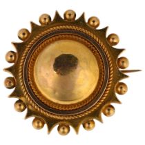 A Victorian Etruscan Revival mourning brooch, unmarked gold settings with central bombe panel and