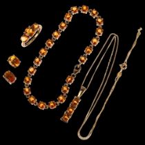 A modern sterling silver-gilt citrine demi-parure, comprising ring, pendant necklace, bracelet and