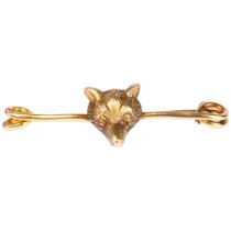 A 9ct gold figural fox mask bar brooch, circa 1900, 31.6mm, 1.2g Bar fitting is slightly bent
