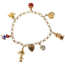 A modern 9ct gold flat curb link charm bracelet with 7 x 9ct charms, 18ct, 9.6g gross No damage or