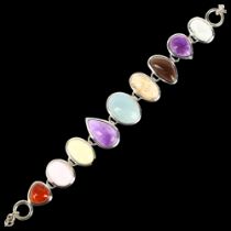 A modern sterling silver gem set panel bracelet, gemstones include amethyst smoky quartz rose quartz