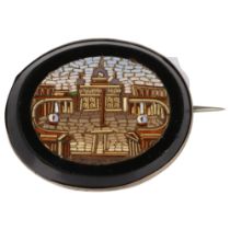 A 19th century Grand Tour St Peter's Square Vatican City micro-mosaic panel brooch, unmarked white