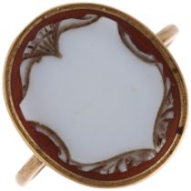 An Antique sardonyx shield cameo ring, unmarked gold settings with relief carved panel depicting