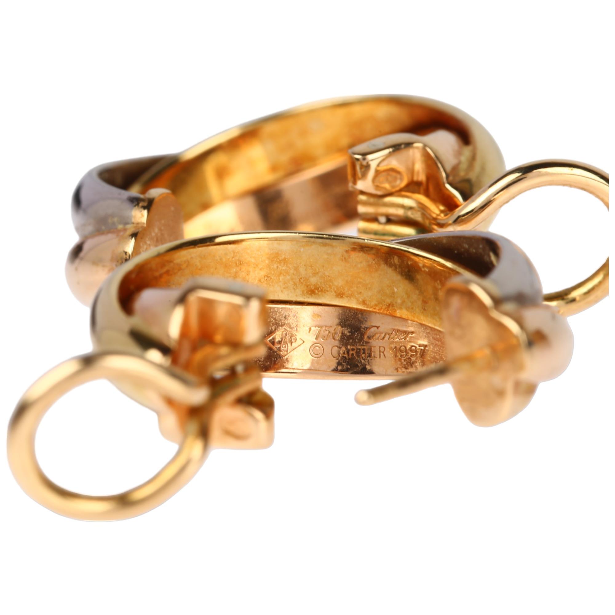 CARTIER - a pair of 18ct three-colour gold Trinity hoop earrings, with English lock fittings, signed - Image 3 of 4