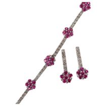 A modern 9ct white gold ruby and diamond flowerhead jewellery set, comprising line bracelet and pair