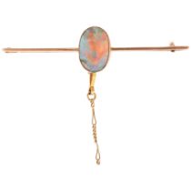 An early 20th century 9ct rose gold opal bar brooch, rub-over set with oval flat cabochon opal