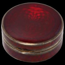 An Art Deco silver and red enamel compact, Cohen & Charles, import London 1926, allover engine