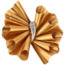 A 1970s 9ct two-colour gold diamond fold brooch, by Zales, 48.2mm, 6.2g No damage or repair, all